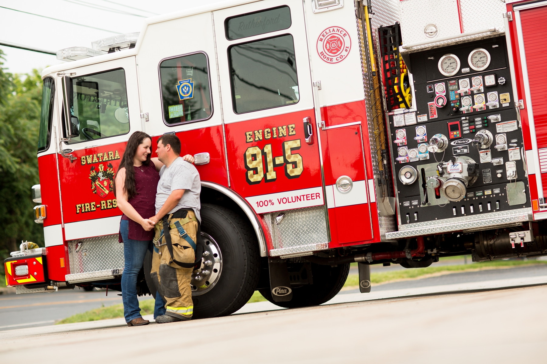 fun engagement photos at the firehouse